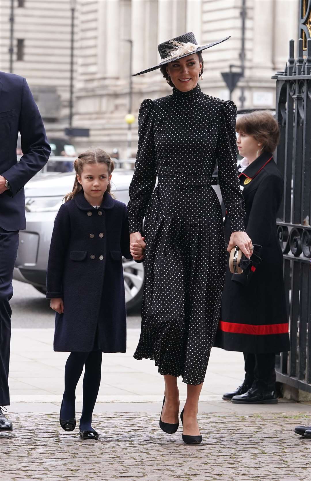 Princess Charlotte held her mother’s hand as they arrived for the service (Aaron Chown/PA)