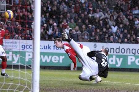 GOAL HERO: Bryan Hughes heads Charlton's late winner. Picture: MATT WALKER