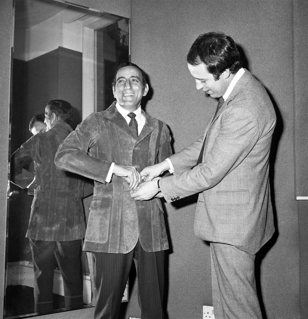 Singer Tony Bennett is fitted by a tailor in Mount Street, London (Archive/PA)