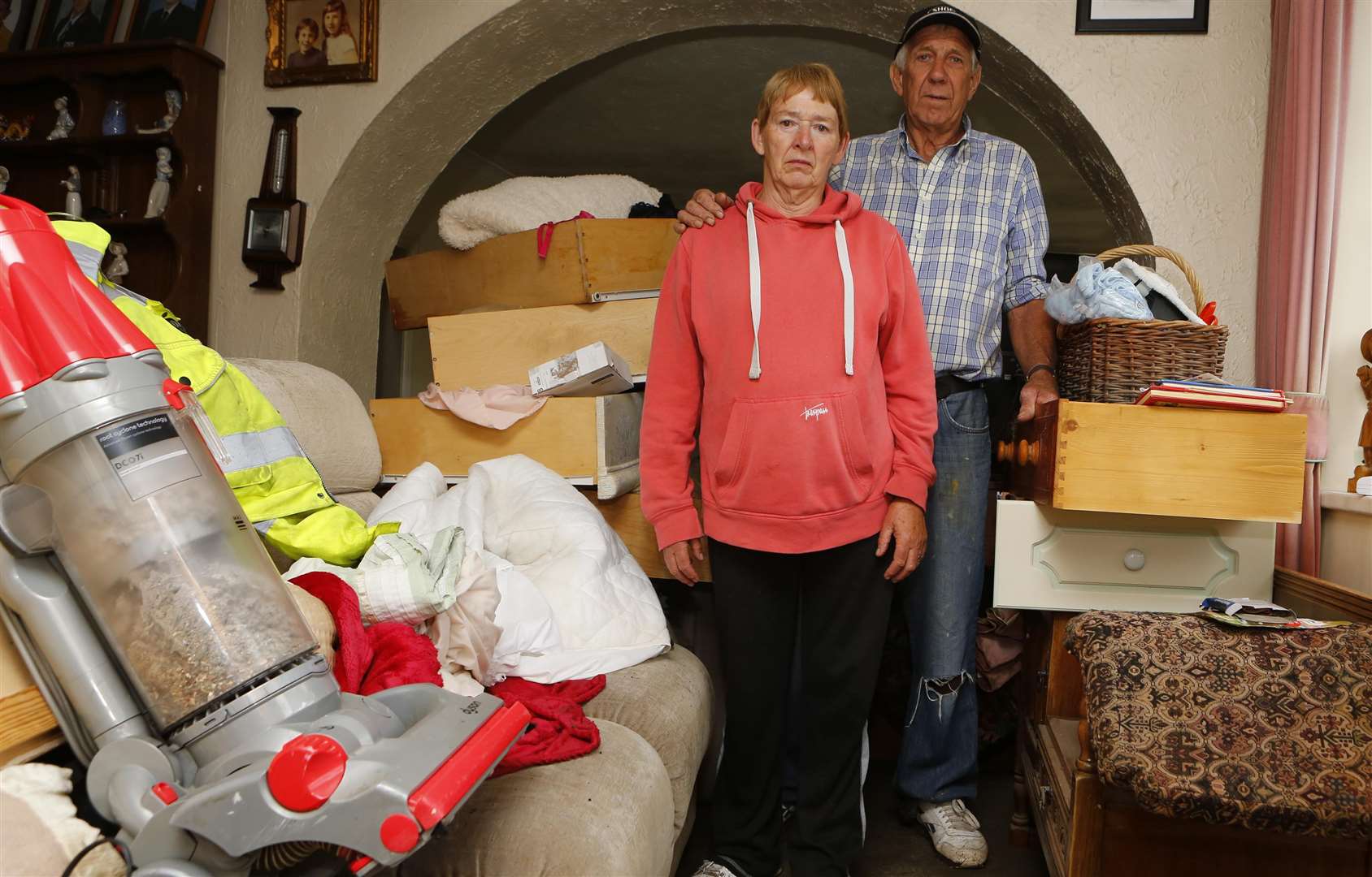 Shirley and John Britcher in their flood-damaged home where they’ve lived for more than 40 years