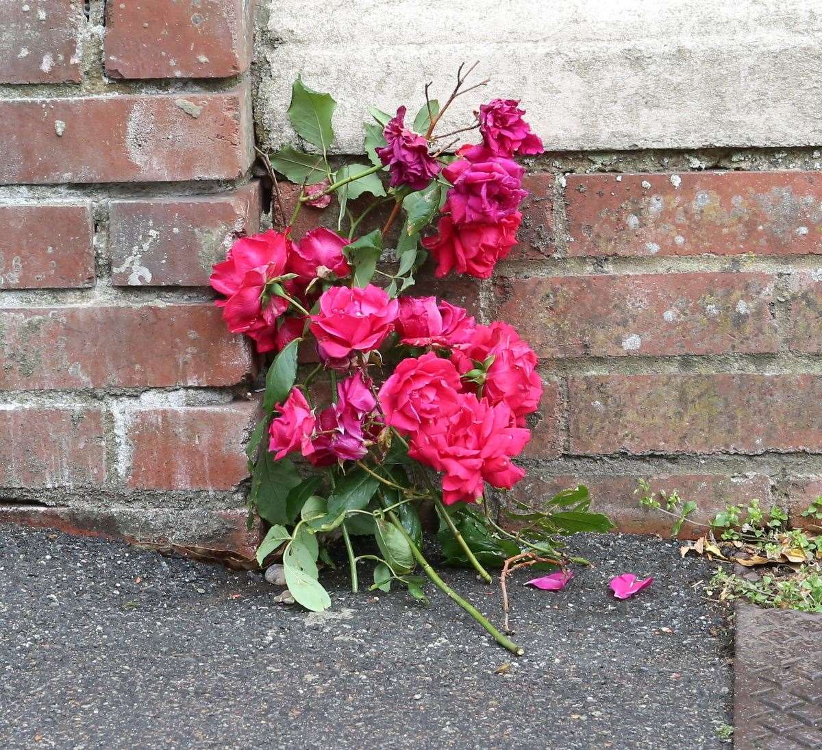 Flowers were left at the scene. Picture: UKnip