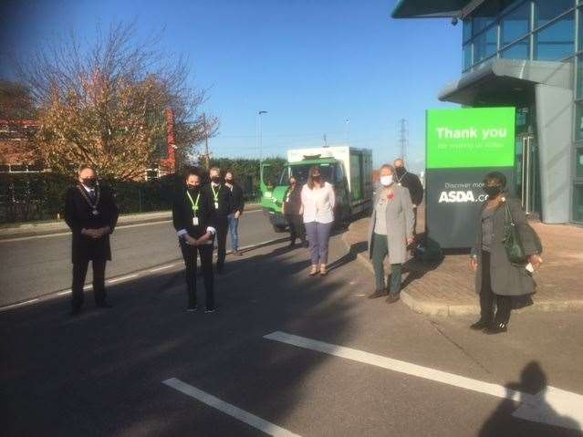 Front row left to right: Town Mayor Peter Harman, ASDA general store manager Alex Pownall, deputy Town Mayor Lesley Howes and Cllr Lorna Cross; together with supporting staff members from ASDA