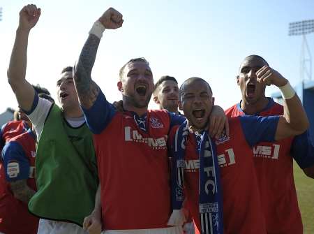 Danny East, Danny Kedwell, Deon Burton, Chris Whelpdale and Leon Legge enjoy the feeling of promotion