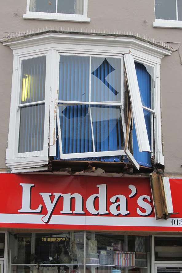 The damage caused to the window above Lynda's in Queen Street this morning