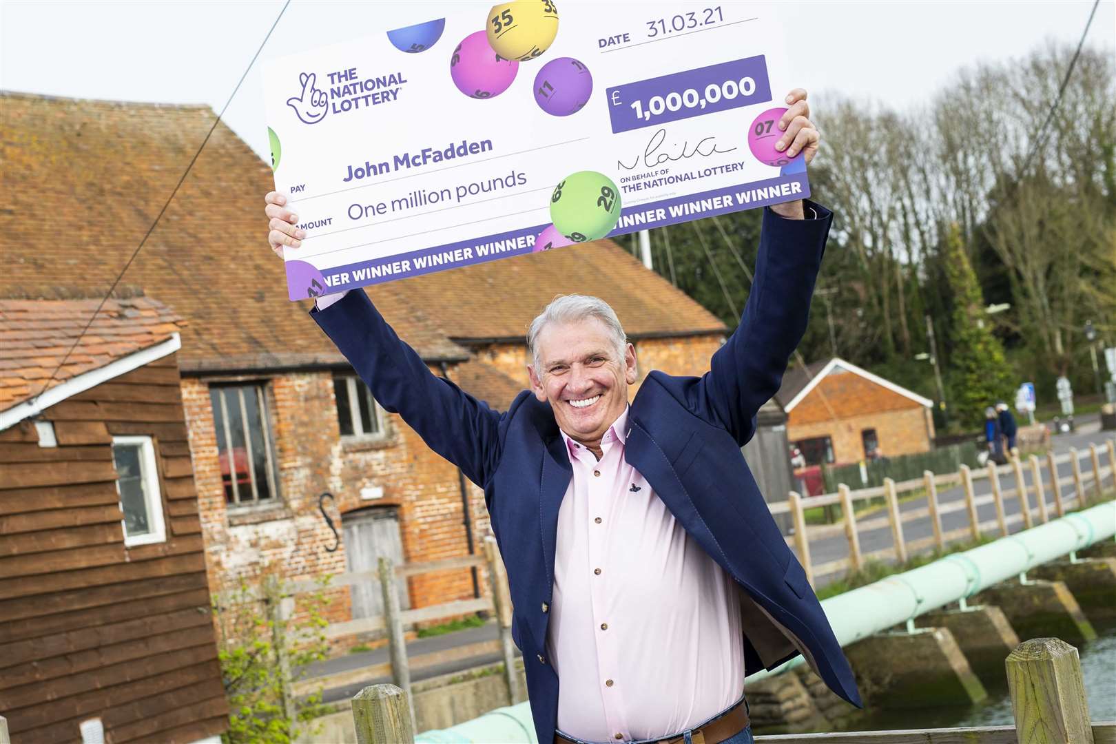 John McFadden celebrates his £1 million National Lottery Scratchcard win (Camelot/PA)