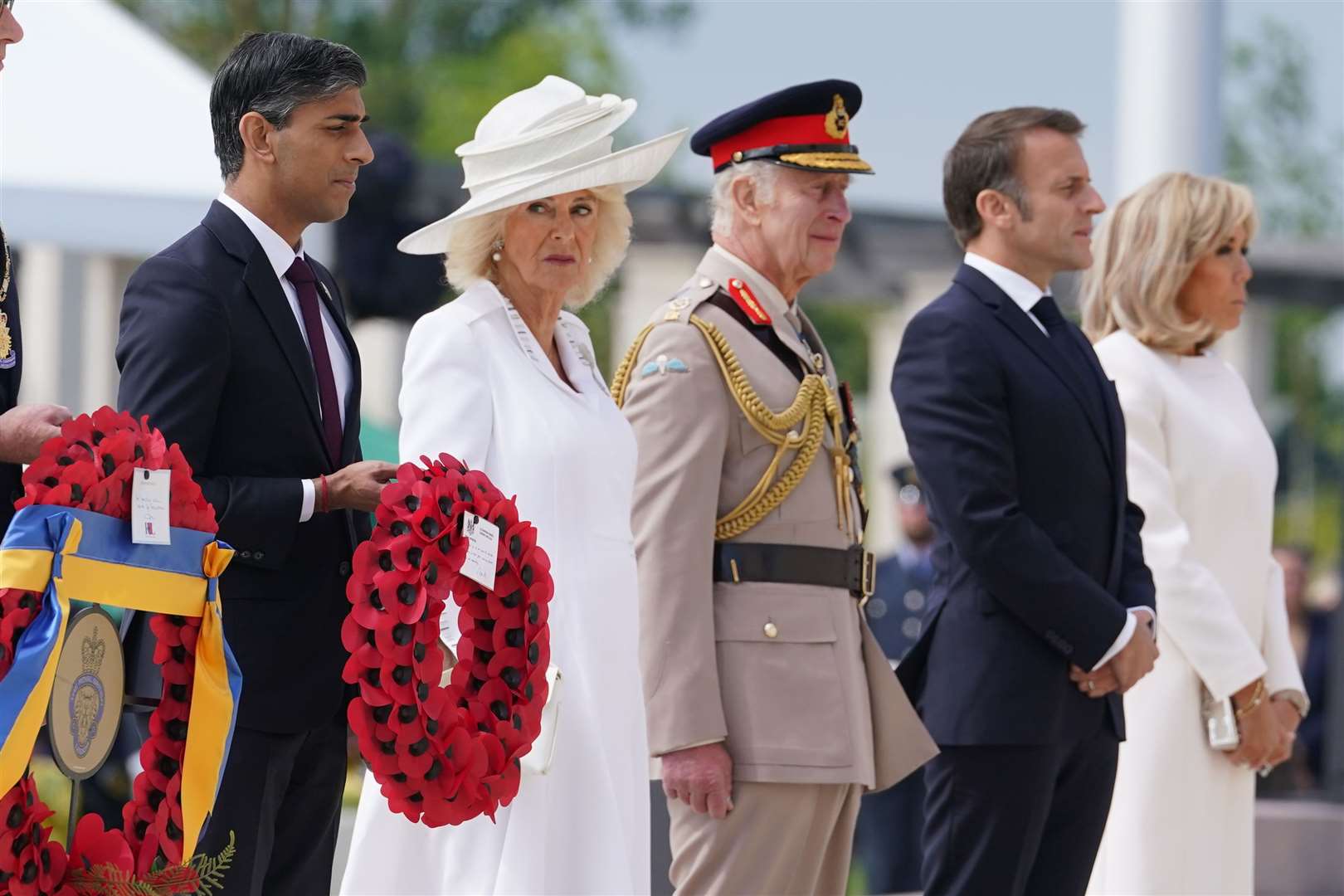 Rishi Sunak, the Queen, the King, French President Emmanuel Macron and Brigitte Macron at the UK national event for the 80th anniversary of D-Day (Gareth Fuller/PA)