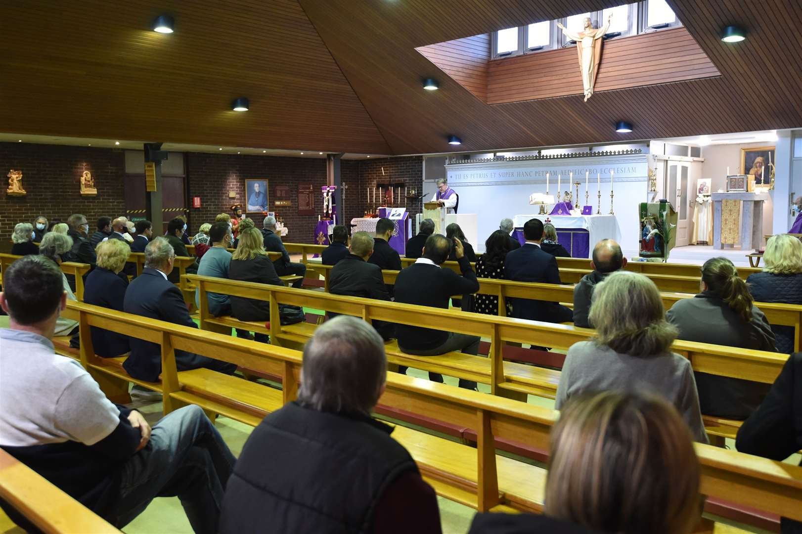 People attend a Catholic mass at St Peter’s church in Eastwood (Nick Ansell/PA)