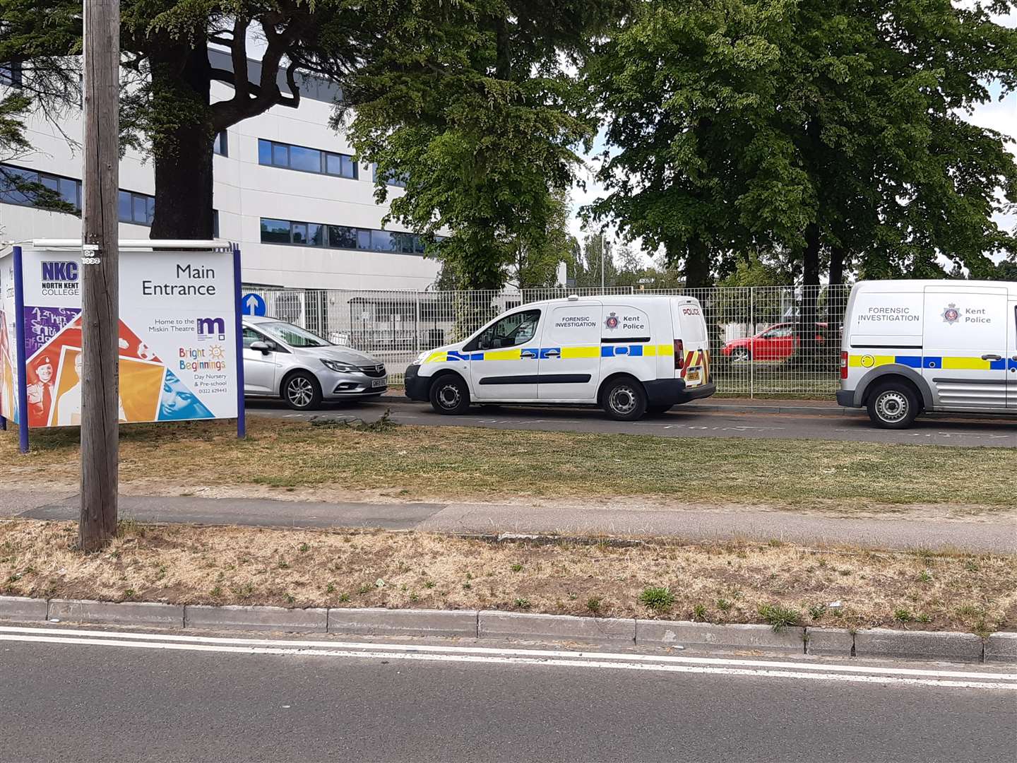 Forensic teams at the house in Oakfield Lane in Dartford where a murder investigation has been launched