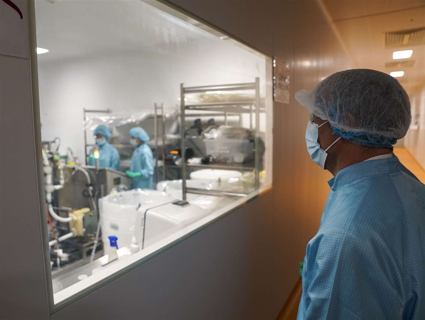 Foreign Secretary Dominic Raab during a visit to Oxbox Biomedica, an AstraZeneca manufacturing site, in Oxford (Steve Parsons/PA)