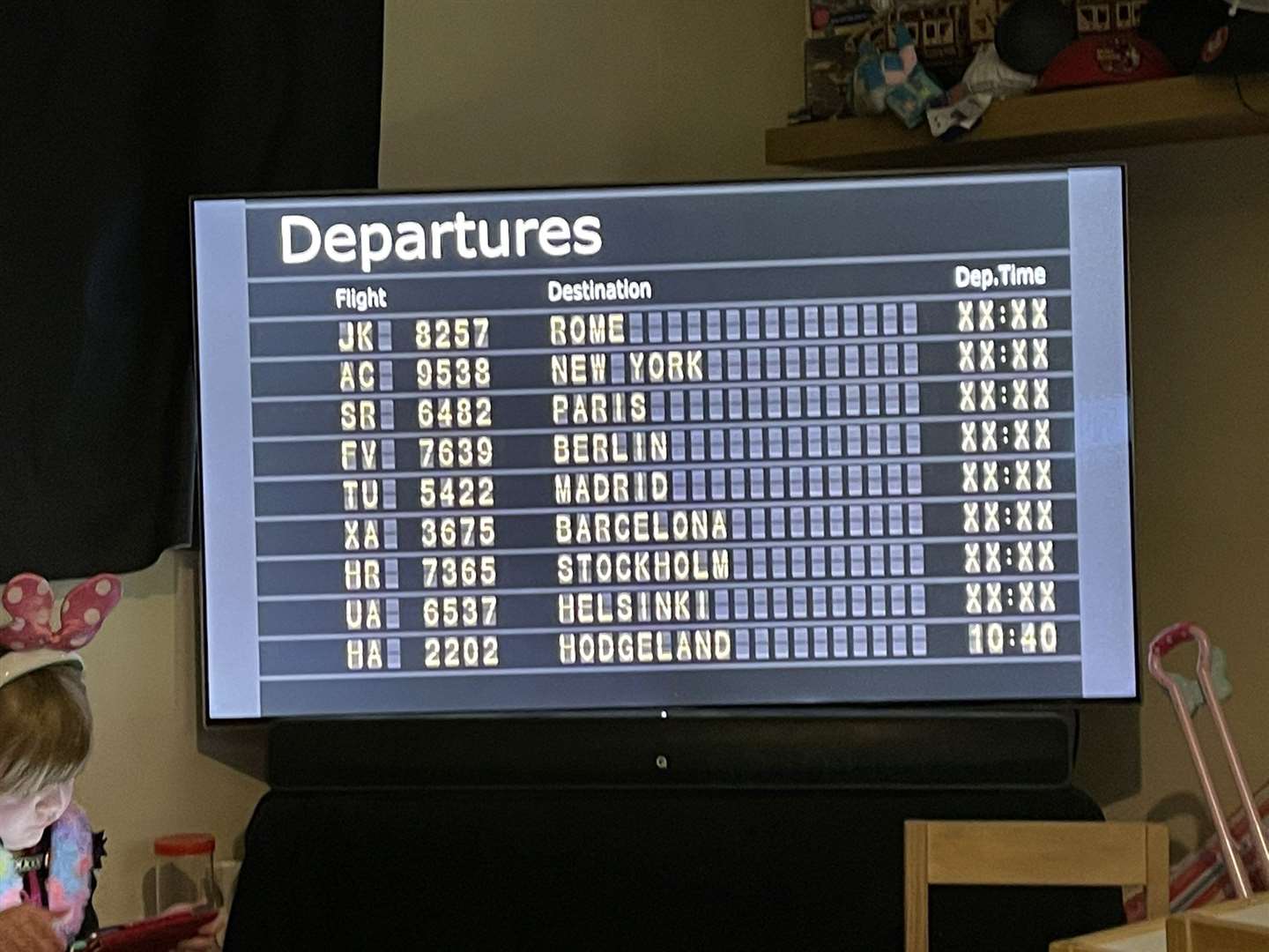 Heather Hodgson put together a departure board for their flight to Hodgeland (Dom Hodgson)