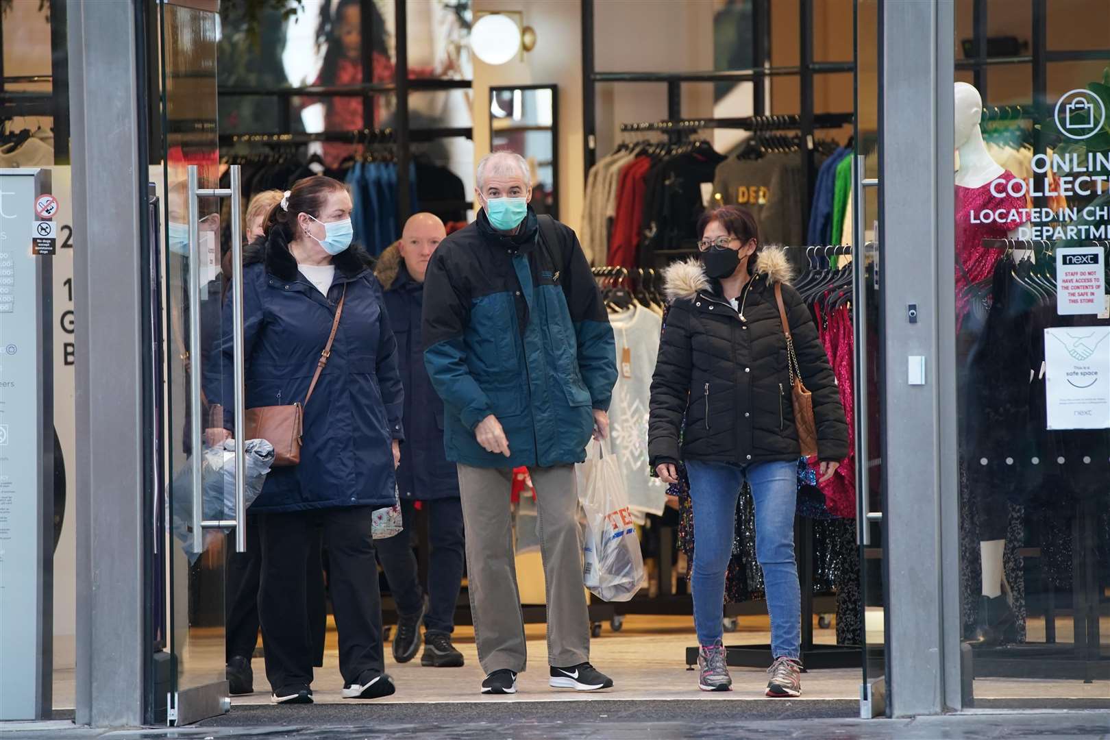 Shoppers in face masks in Liverpool (Peter Byrne/PA)