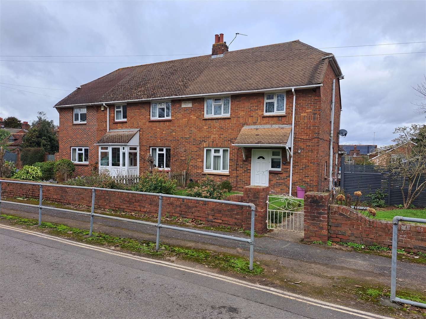 The trust owns two houses, including this one on the right. which it is proposing to pull down to create a 32-space car park.