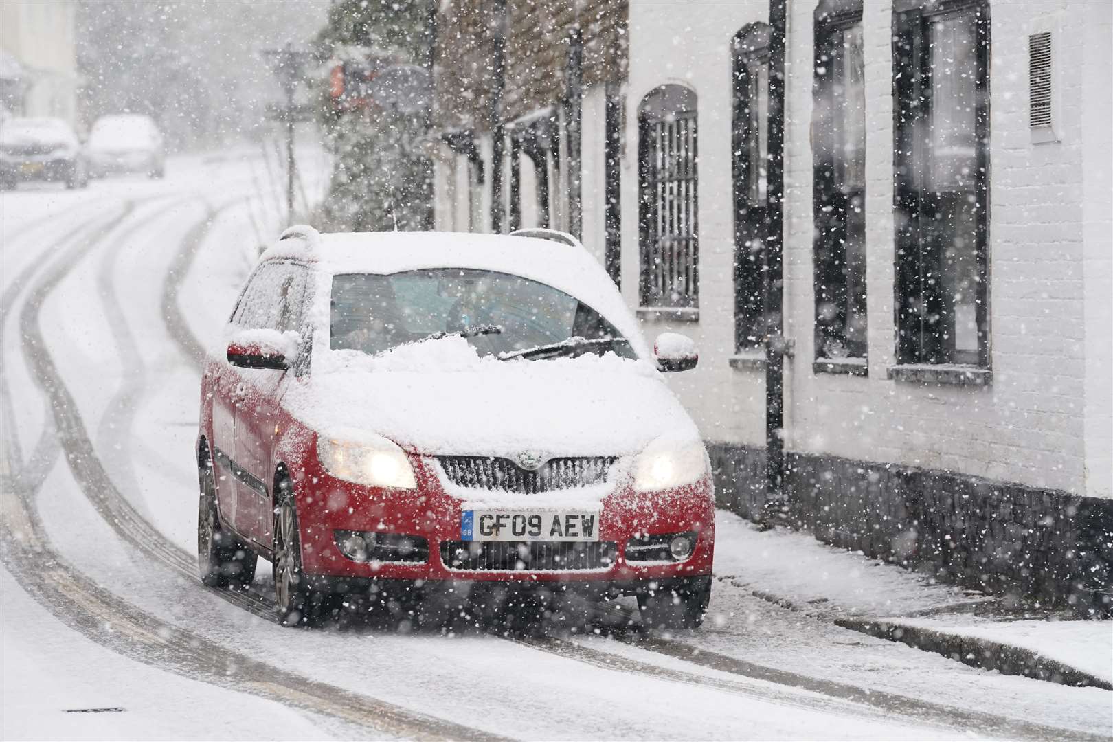 A motorist tackles a snowy road in Kent (Gareth Fuller/PA)2024.