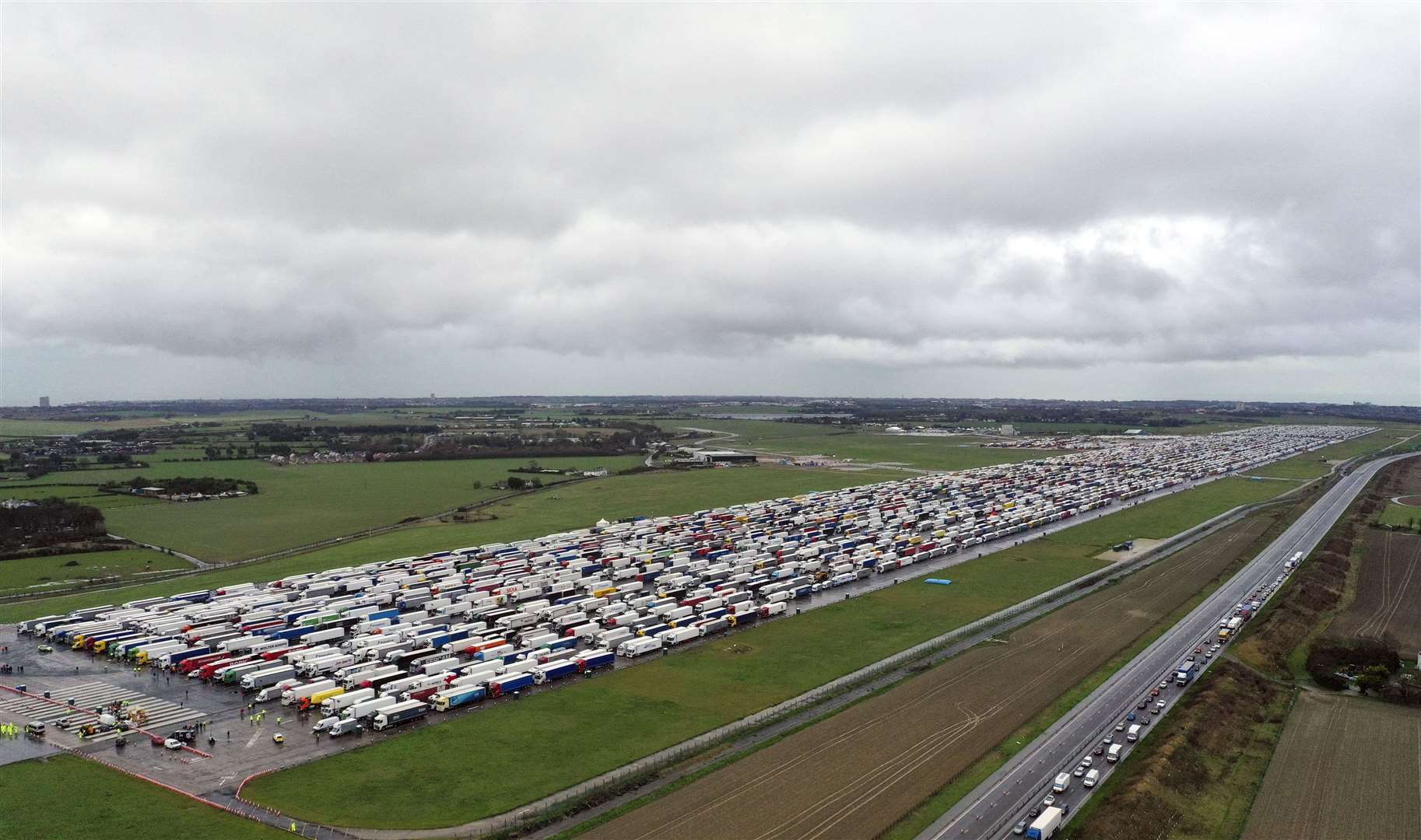 Freight lorries lined up at Manston Airport in Kent (Steve Parsons/PA)