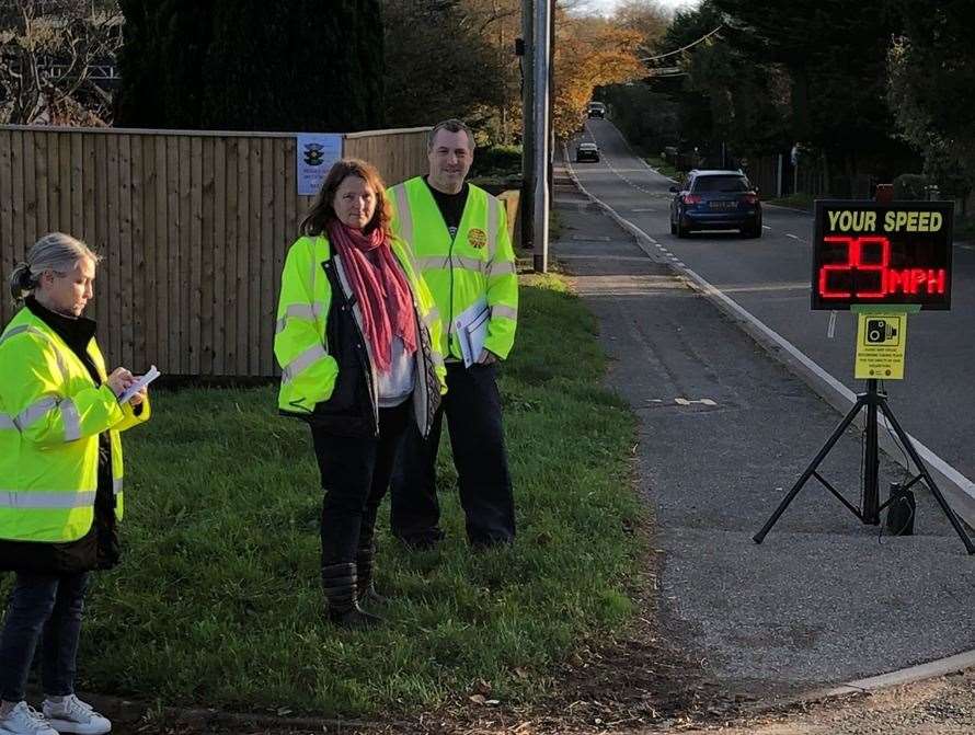 Caroline McFadden, left, neighbour Debbie Hedgecock, centre, and Sean McFadden, right, carry out Community Speedwatch