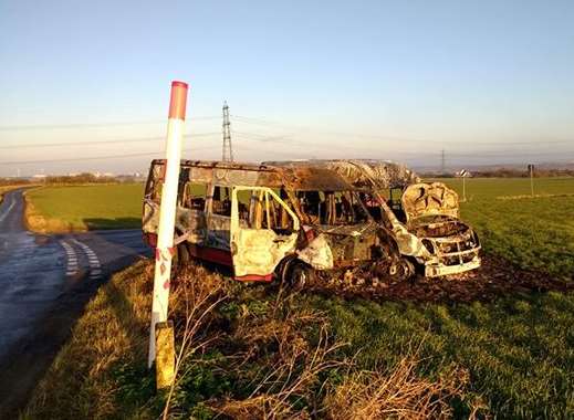 The remains of the torched buses