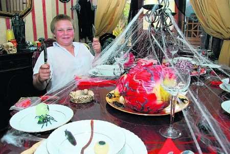 What's for dinner, mum? Xavier Hayward,10, has a great appetite for Hallowe'en celebrations