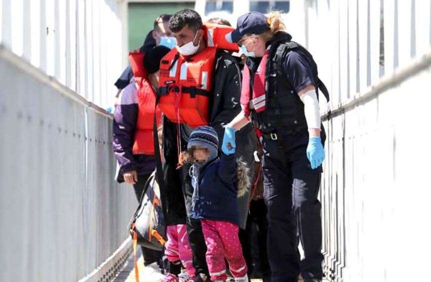 People arrive in Dover following a small boat incident in the Channel. Picture: Gareth Fuller/PA