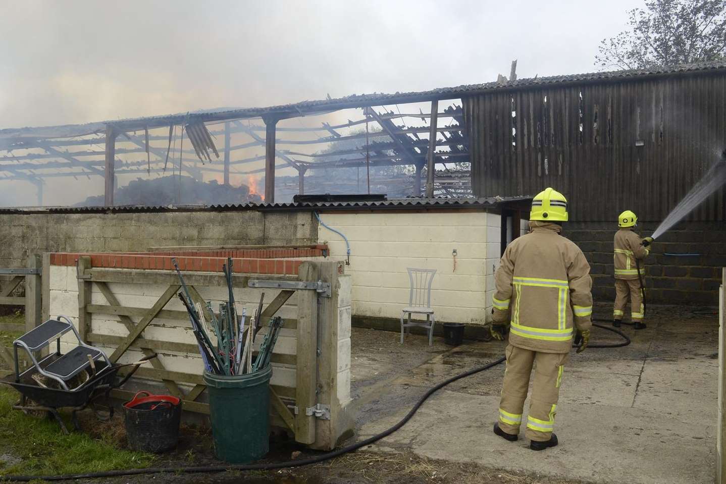 Firefighters tackle the barn blaze in Elm Lane, Minster. Picture: Chris Davey