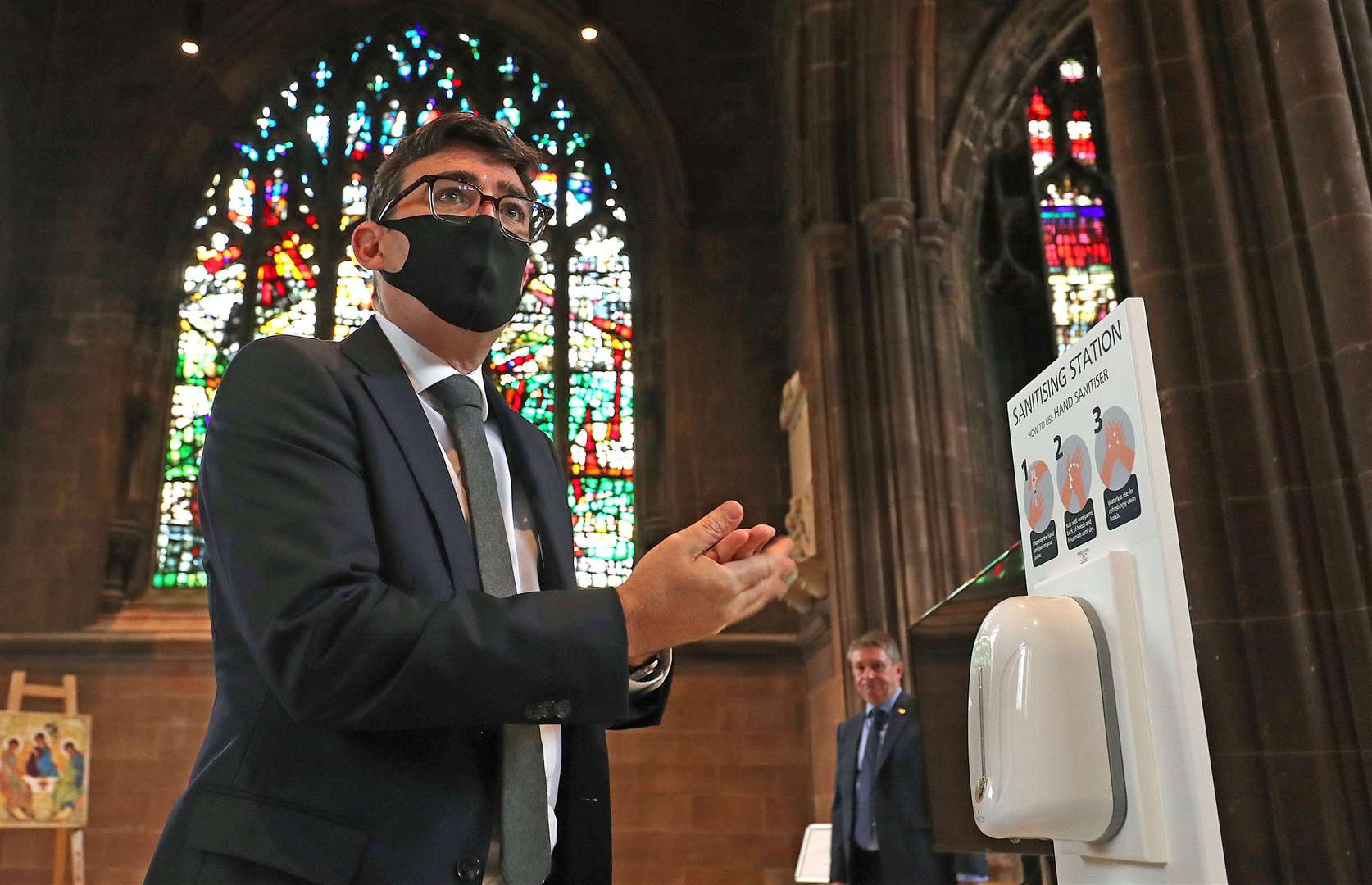 Andy Burnham takes part in a memorial service for the victims of coronavirus at Manchester Cathedral (Martin Rickett/PA)