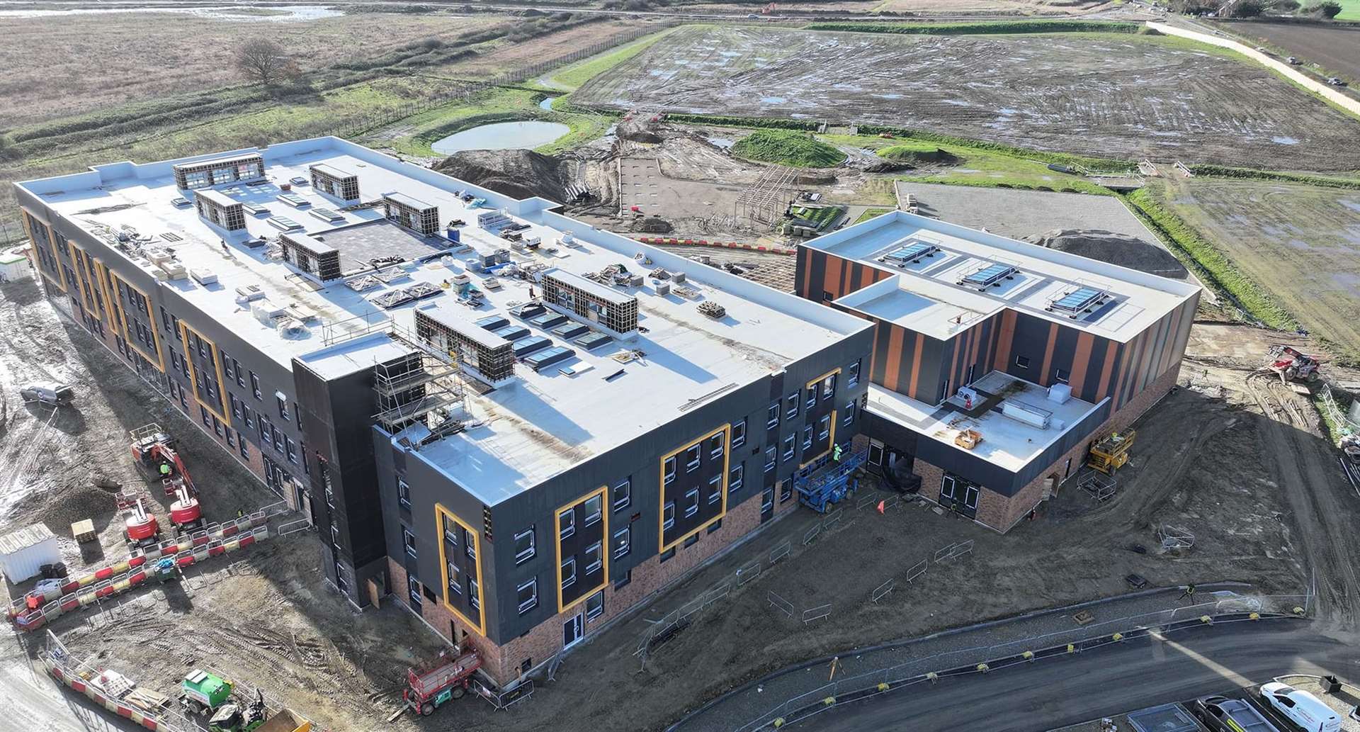 An aerial shot shows the progress on the construction of Chilmington Green Secondary School. Picture: Bowmer + Kirkland