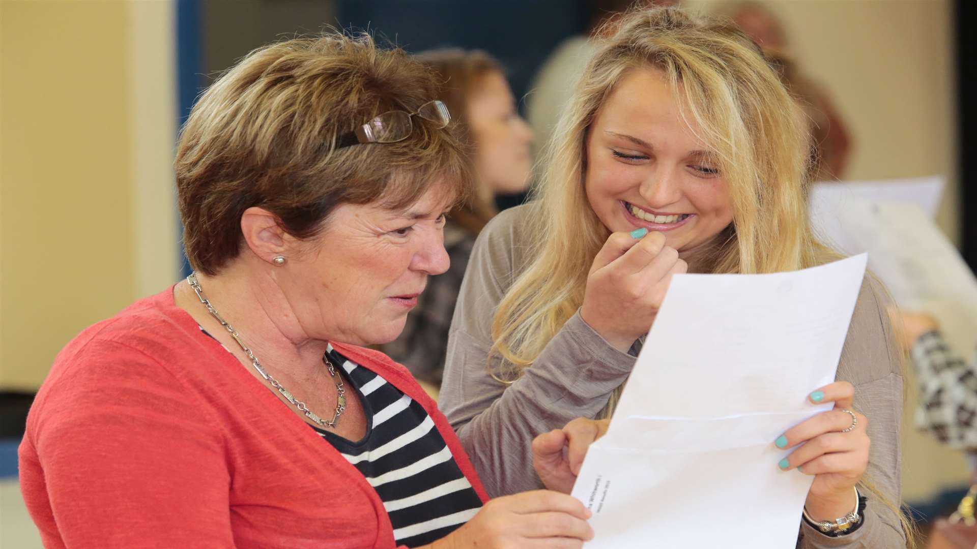 Maidstone Grammar School for Girls deputy head Hilary Magee celebrates with Emma Whitworth