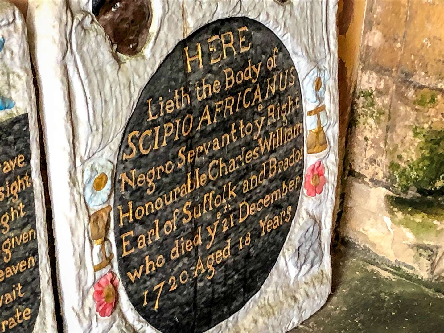 A headstone in the entrance to St Mary’s church in Henbury (Ben Birchall/PA)