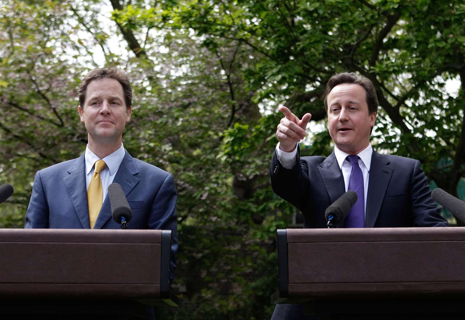 David Cameron and Nick Clegg hold their first joint press conference in the Downing Street garden (Christopher Furlong/PA)