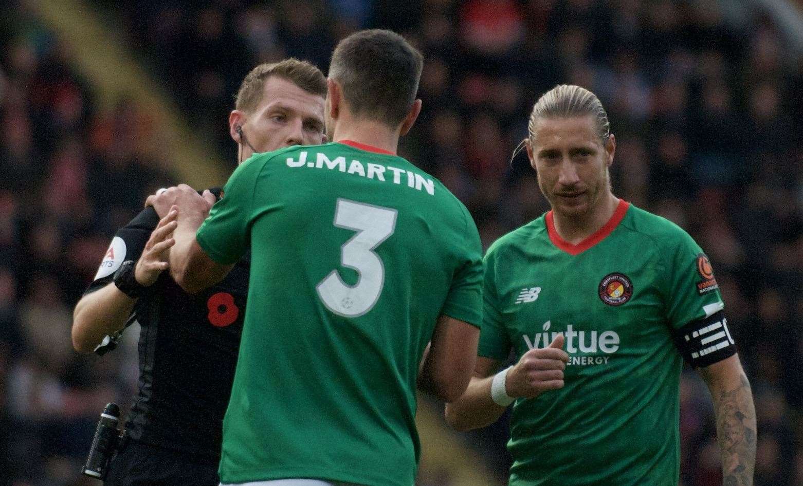 Ebbsfleet players make their point to referee Will Finnie on Saturday. Picture: Ed Miller/EUFC