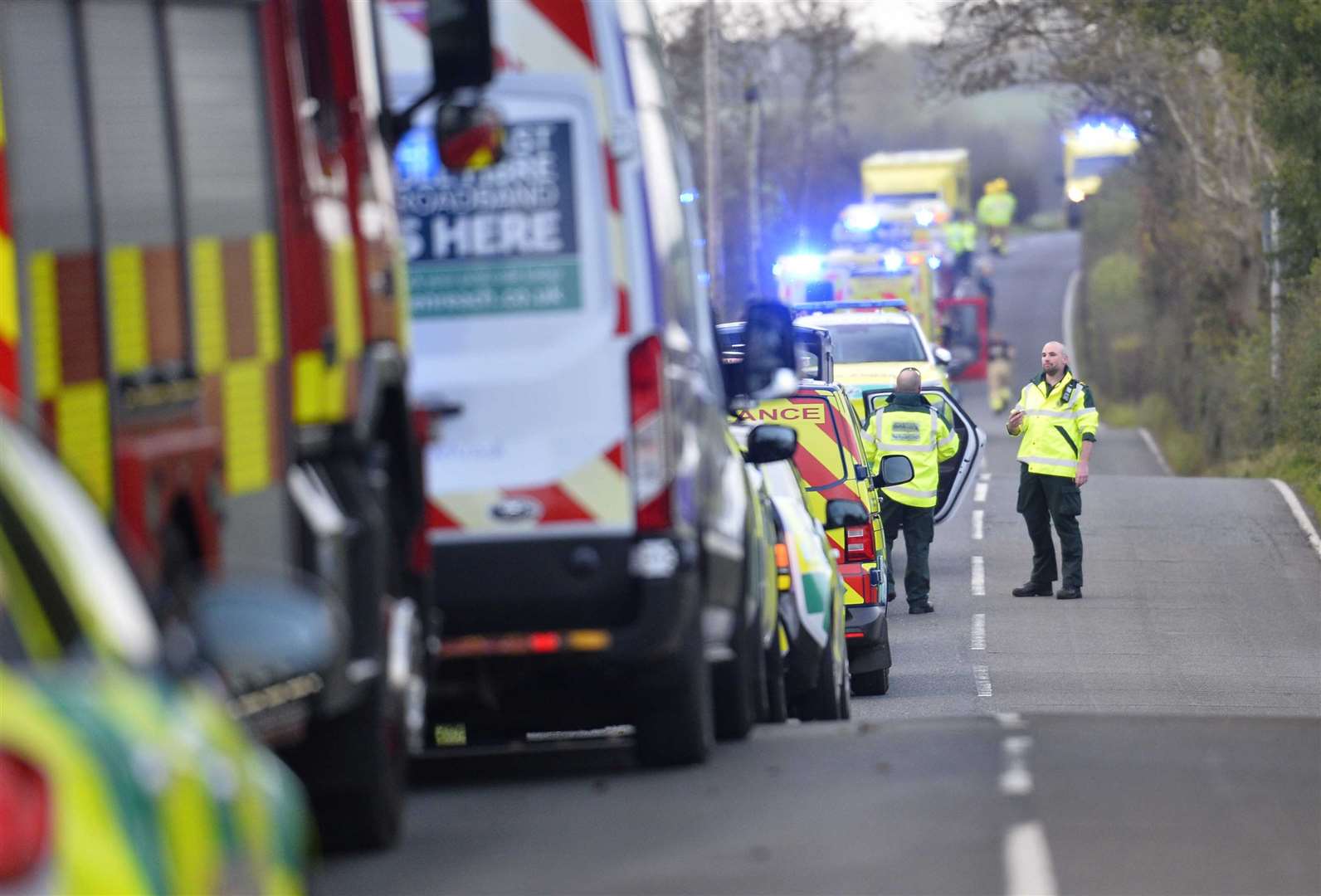 Emergency workers at the scene of a school bus crash on the Ballyblack Road East near Carrowdore (Mark Marlow/PA)