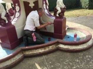 Robert Mouland painting the Sidney Cooper Weston Fountain in Folkestone. Picture: Cllr Mary Lawes