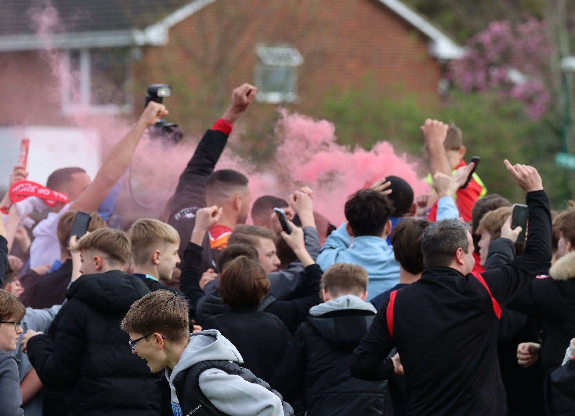 Hornchurch fans celebrate at the full-time whistle as their team become Isthmian Premier champions after beating Chatham Picture: Max English @max_ePhotos