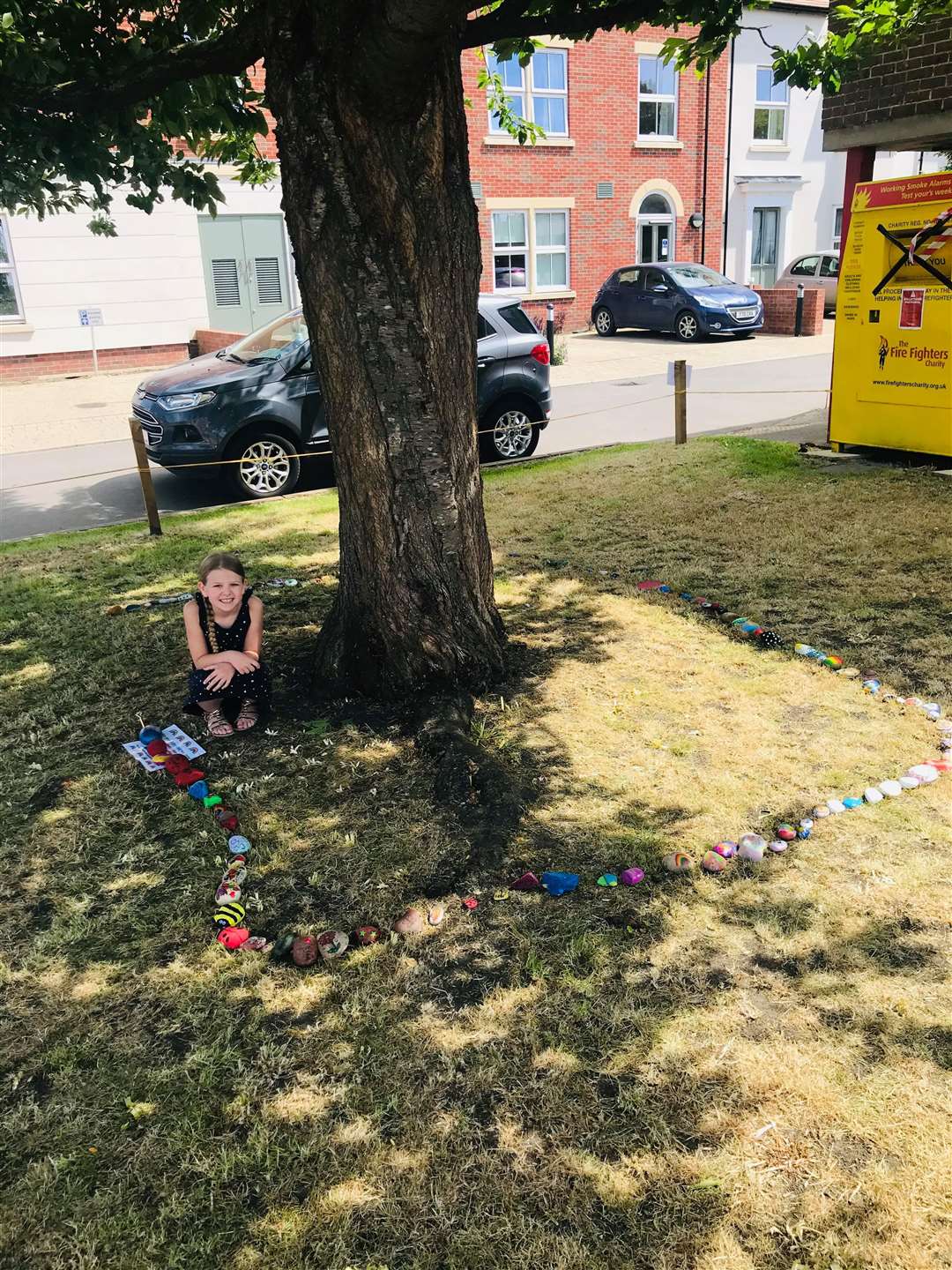 Holly Barrett’s daughter Mimi has painted a number of stones for the snake in Abingdon (Holly Barrett/PA)