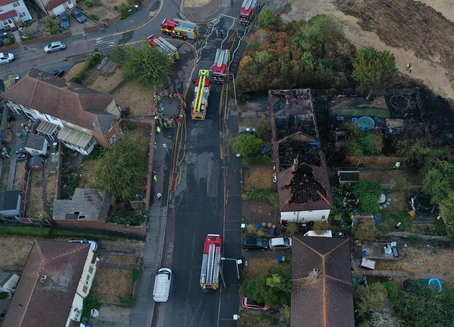 Dramatic aerial pictures show the scale of a huge fire which swept through four homes in Crayford Way, Crayford, near Dartford. Photo: UKNIP