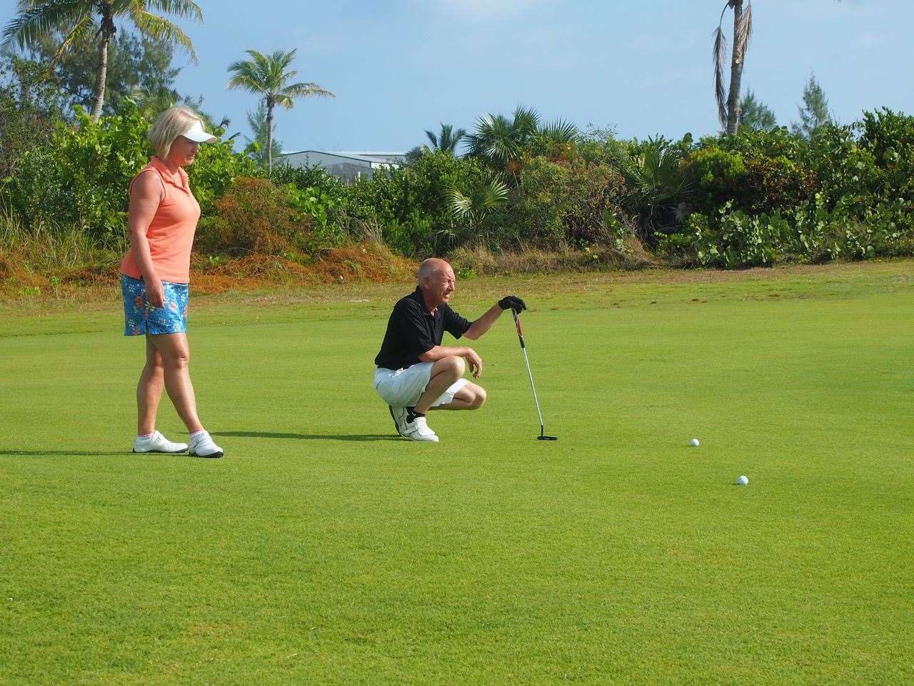 Allan and Sharon Jordan getting some putting practice in on a golf course