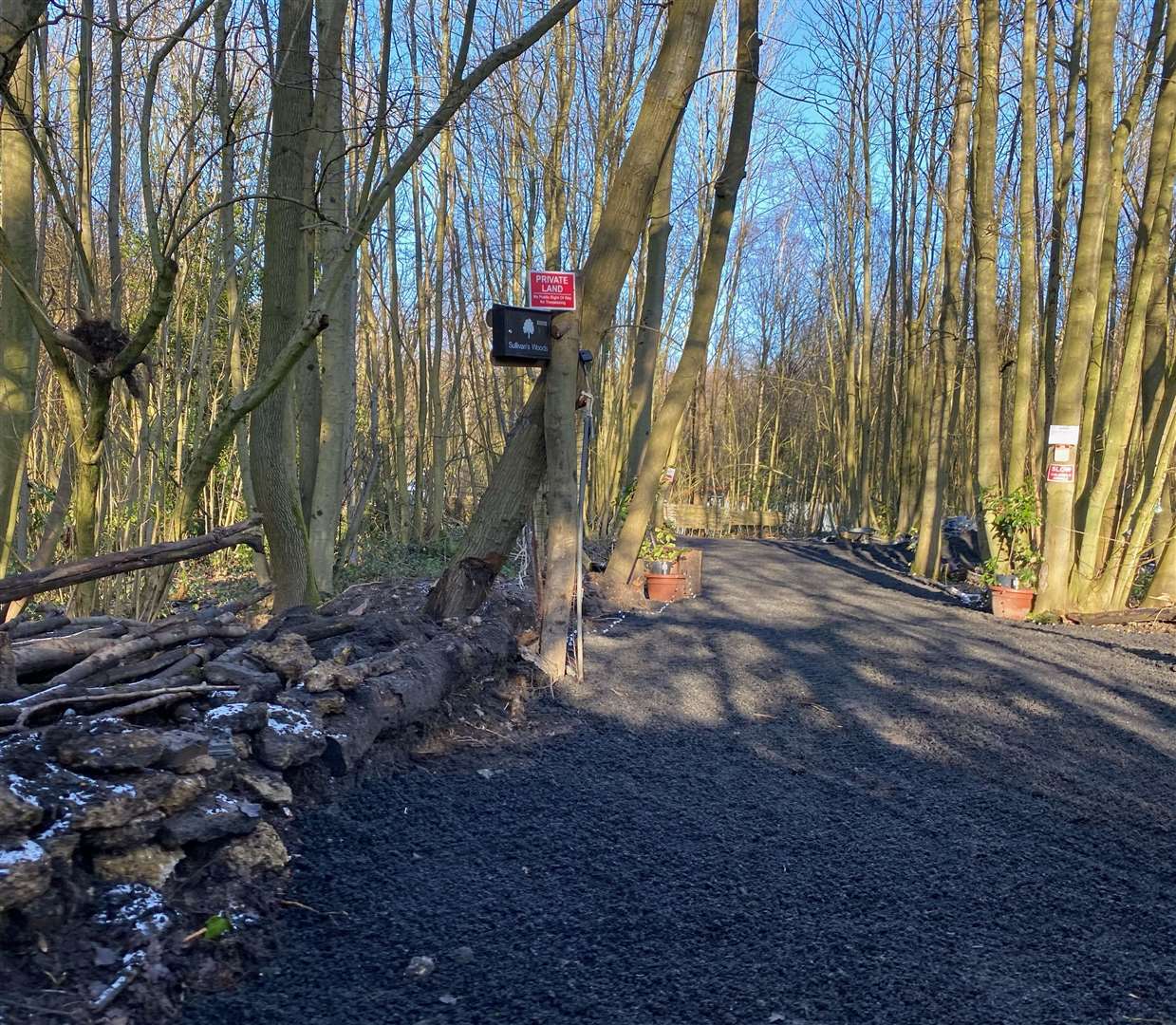 A tarmac road was laid at Fowler's Stone Wood, a protected green belt site.