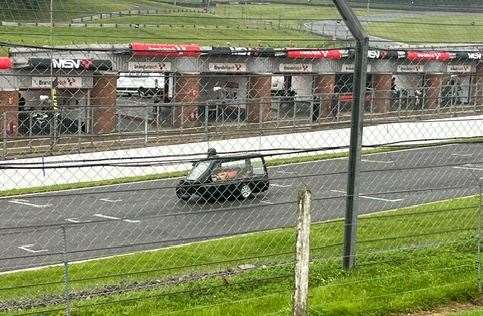 The motorbike hearse drove around the race circuit