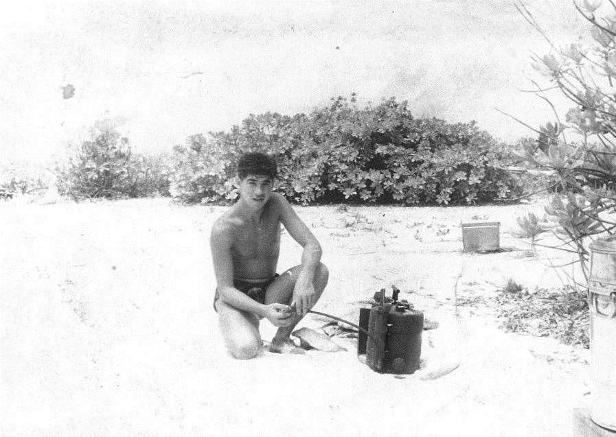 Young serviceman Terry Quinlan making a brew on Christmas Island in 1957