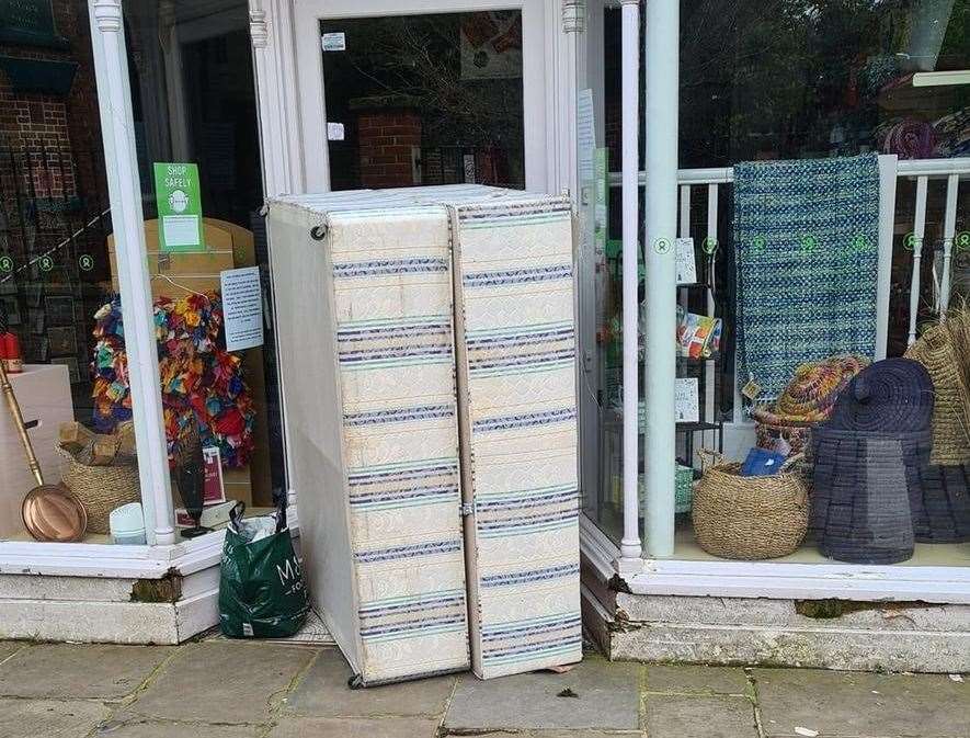 The shop does not accept donations of bulky furniture, yet a 'rotting' double bed base was dumped in its doorway earlier this year. Picture: Arlene Rae