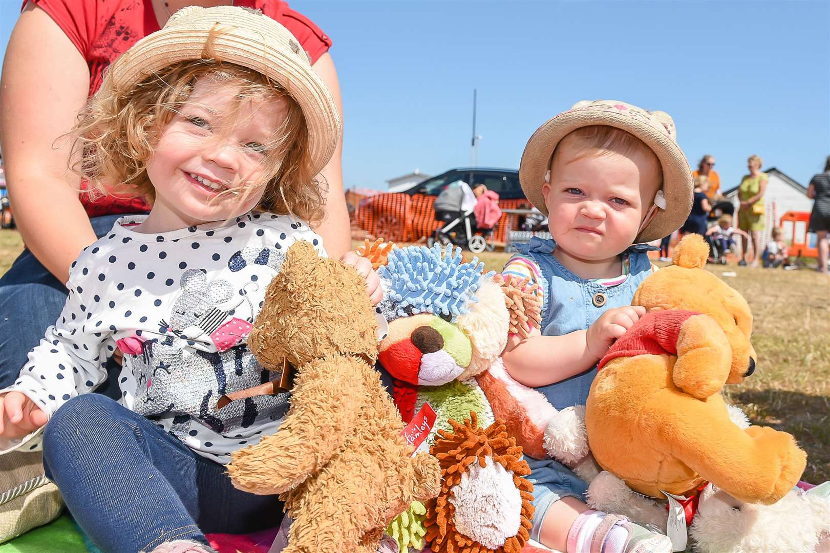 Alice and Poppy Farr with their teddies at a past Teddy Bears Picnic