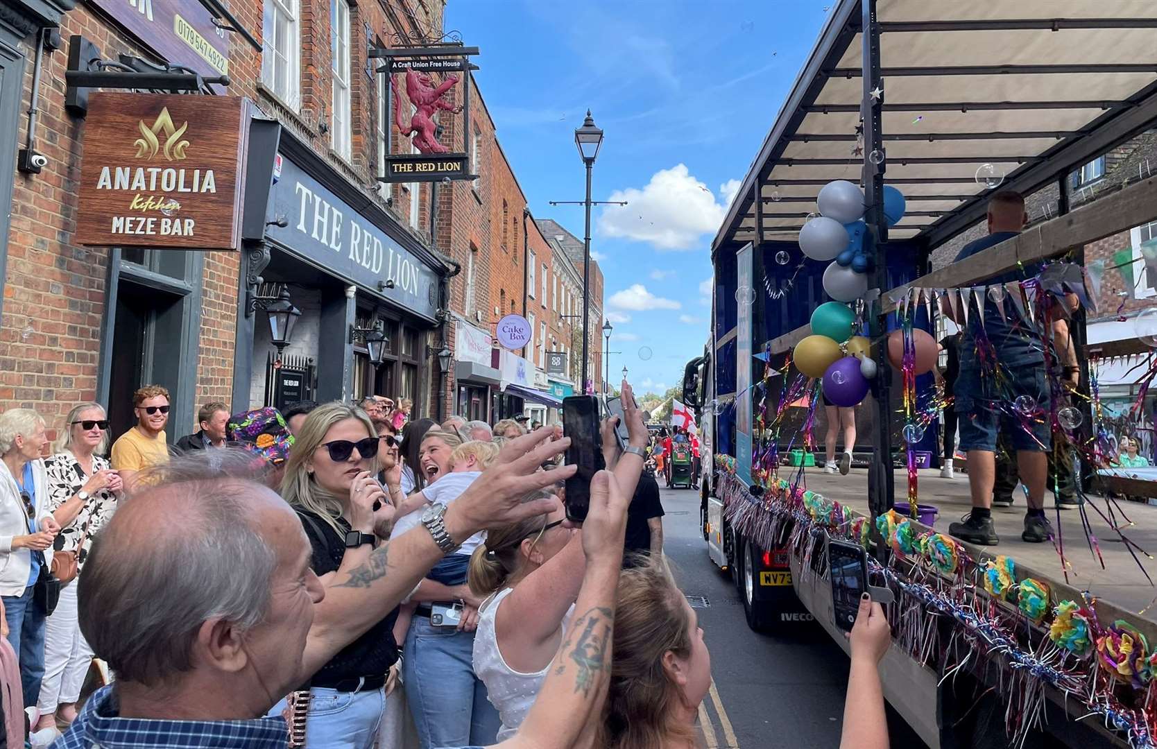 Crowds lining the streets outside the Red Lion in Sittingbourne High Street. Picture: Joe Crossley