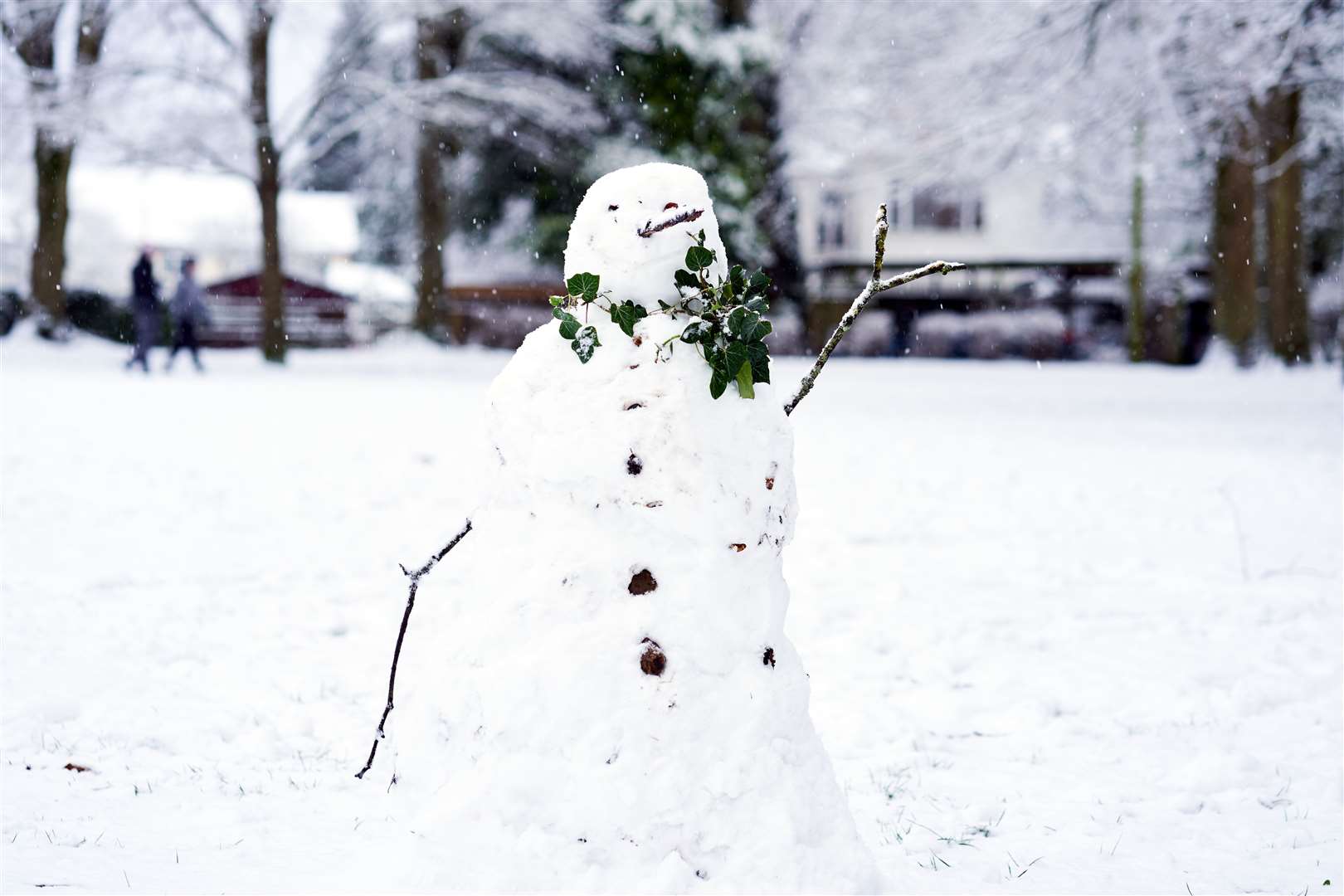 A snowman in Camberley, Surrey (John Walton/PA)