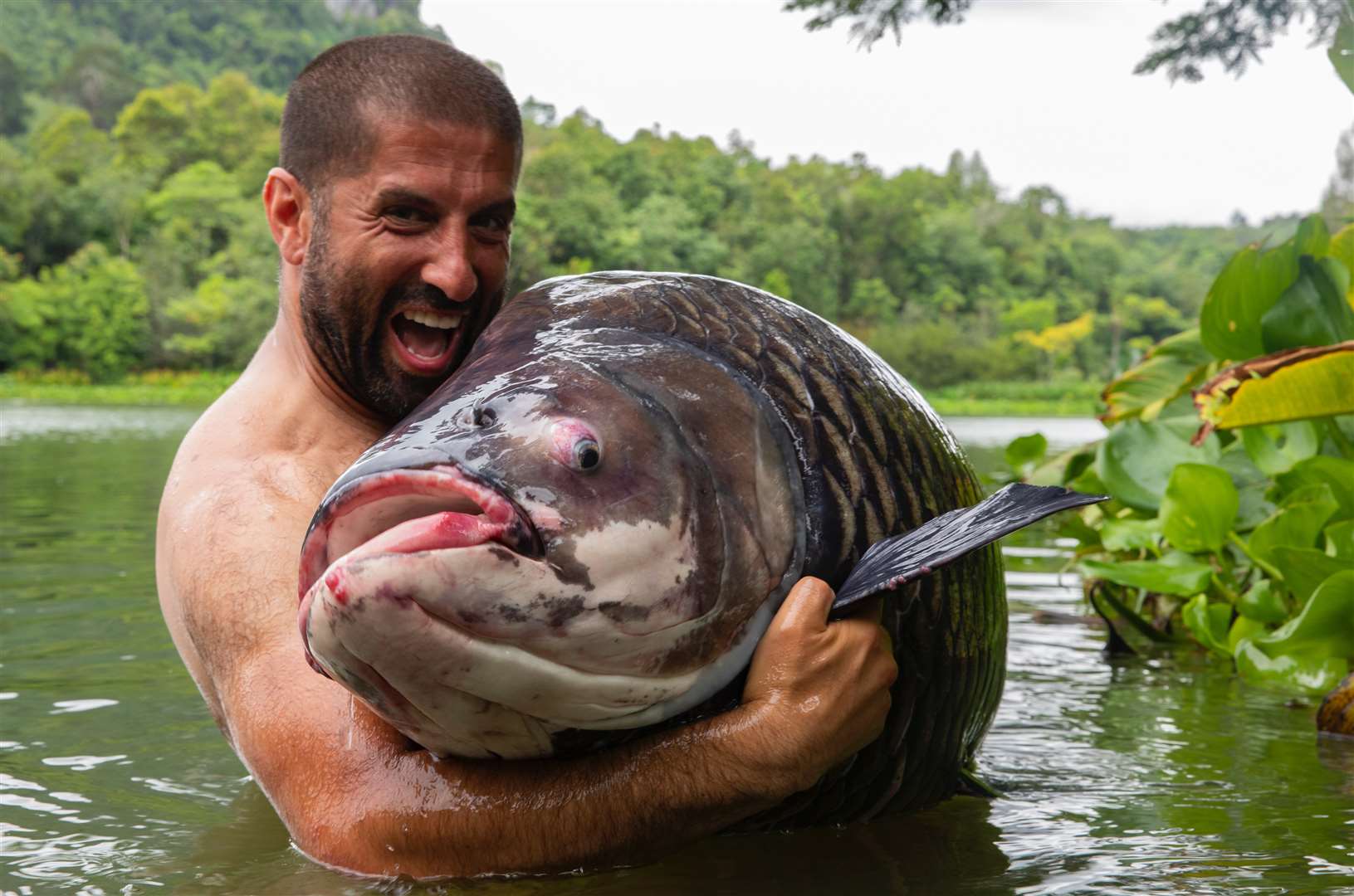 Ali Hamidi, presenter of ITV’s Monster Carp and the Big Fish Off, believes allowing angling will be a boon to the nation’s mental health (Korda Developments/Gary Newman)