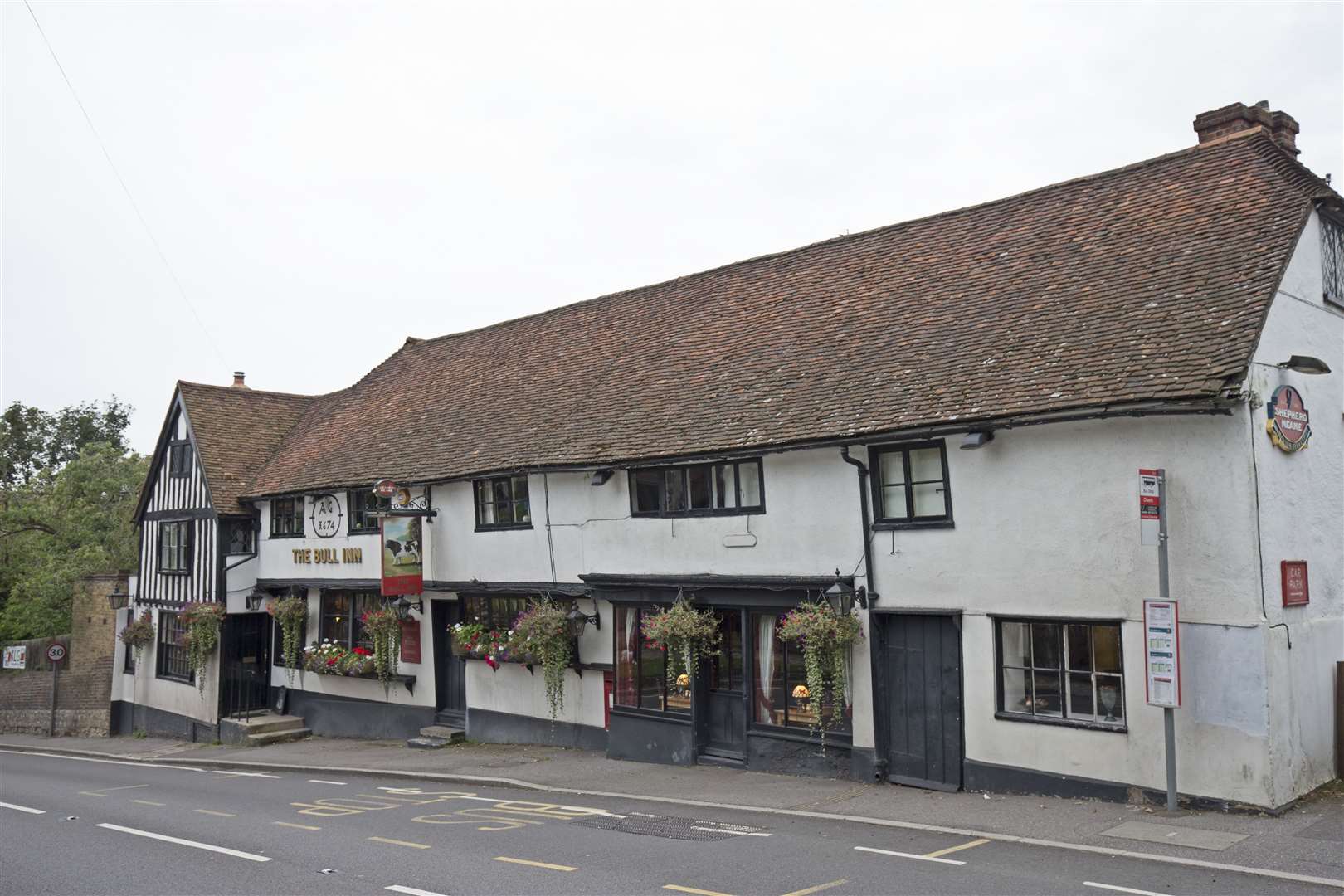 On Linton Hill, the historic Bull Inn has leather sofas, a modern menu and an inviting garden with great view