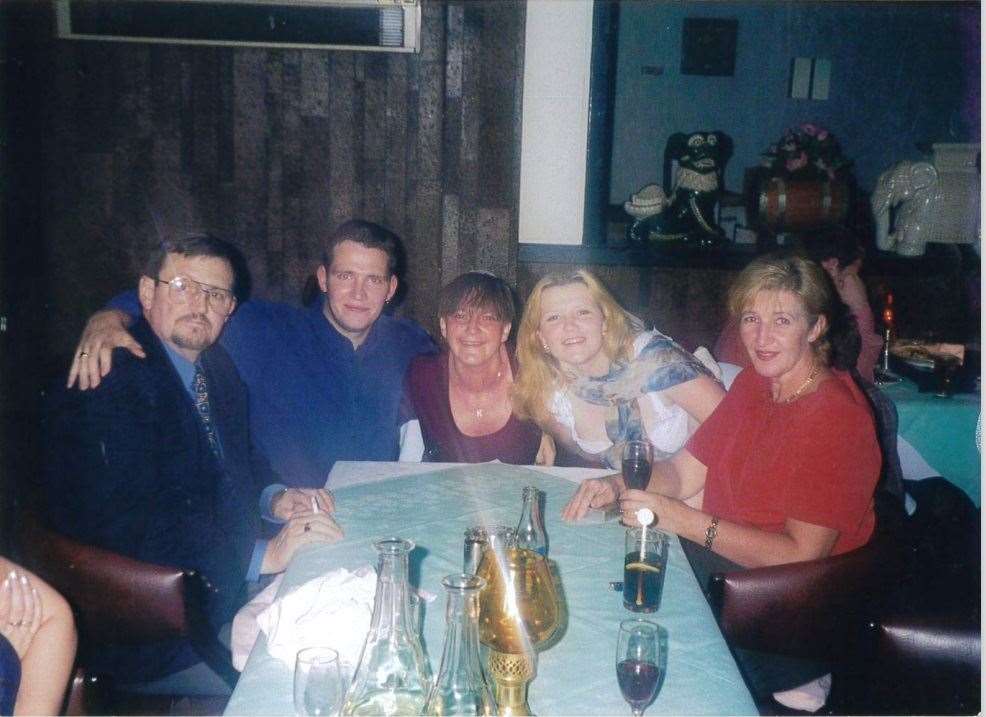 Emma Caldwell, centre right, pictured with her family (family handout/PA)