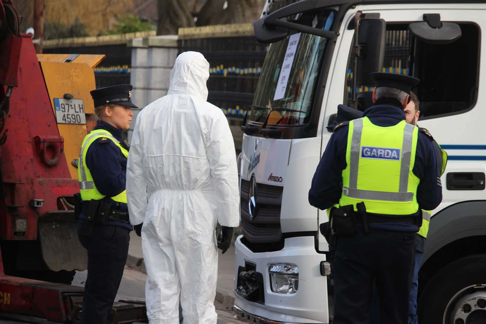 Emergency services attend after a large lorry crashed into the gates of the Russian Embassy in Dublin (Dominic McGrath/PA)