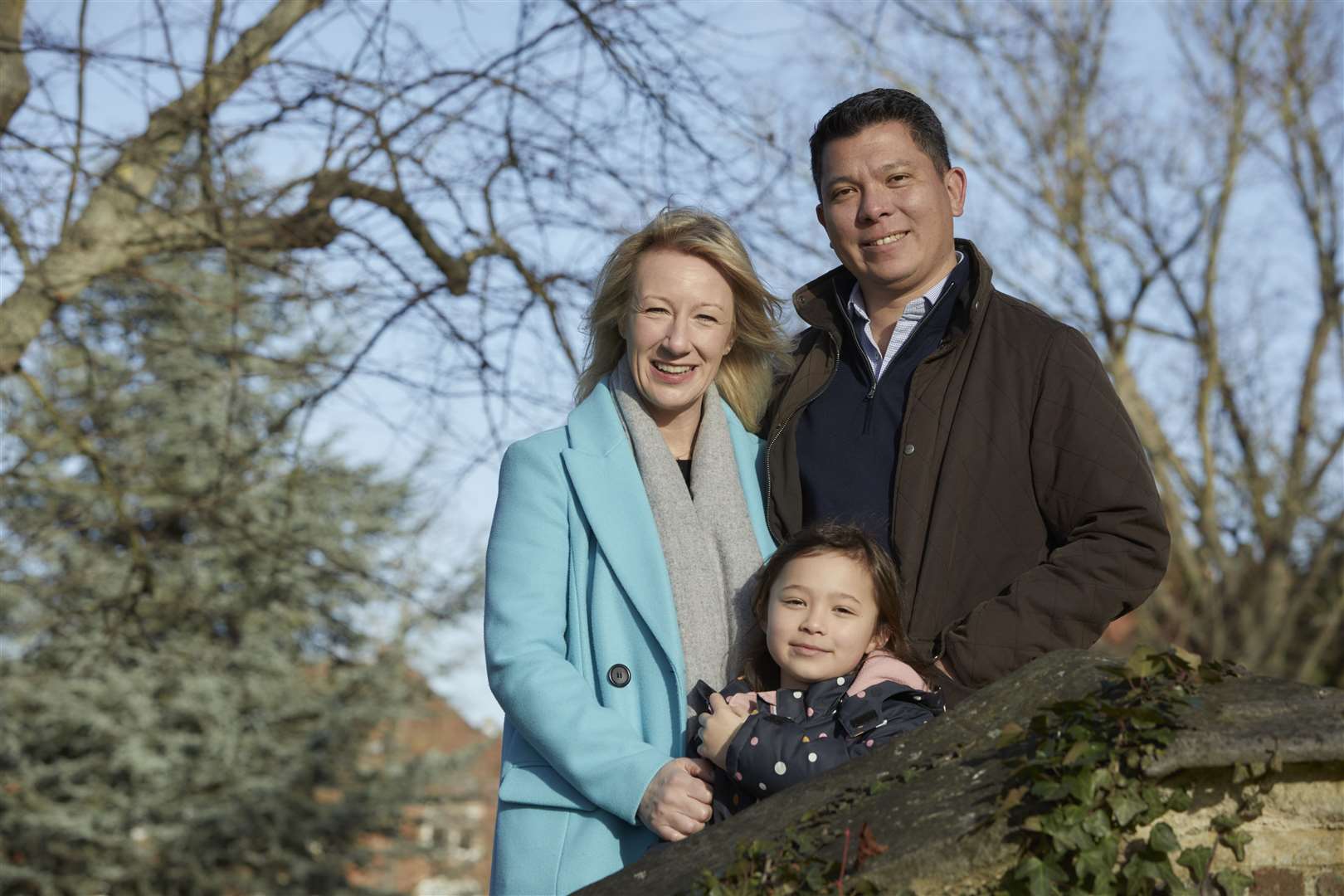 Emma Pattison, 45, her husband George, 39, and their daughter Lettie (John Wildgoose/Epsom College/PA)