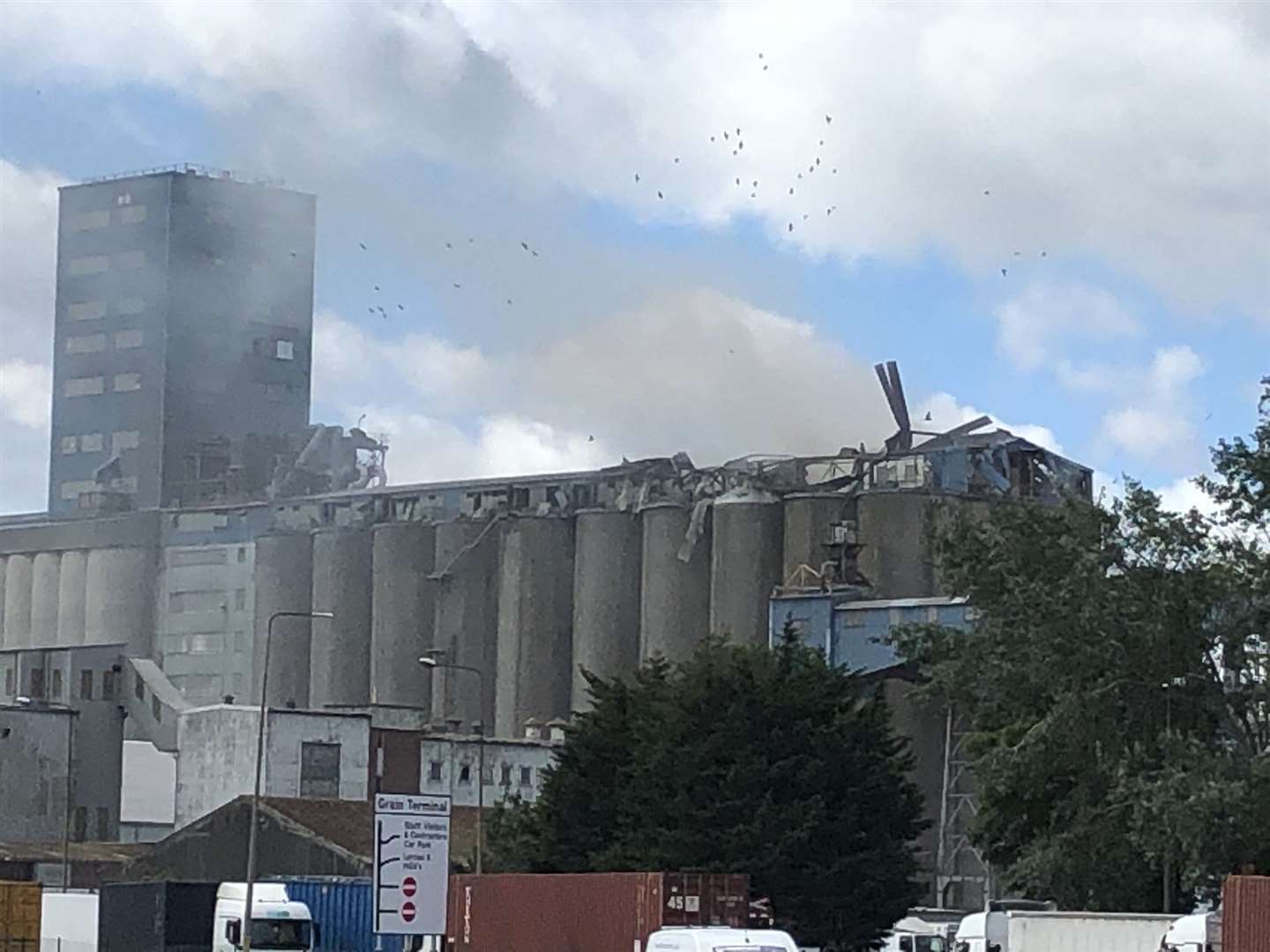 Fire crews were called to the port of Tilbury after an explosion. Picture: @TonyRAgg