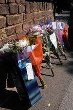 Flowers and notes at the scene of the crash at the junction of Mierscourt Road and Lonsdale Drive, Rainham