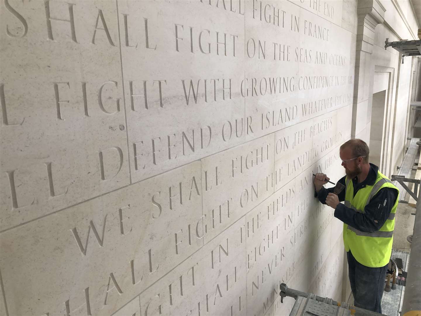 Winston Churchill’s famous speech being carved at the new British Normandy Memorial (National Memorial Trust/PA)